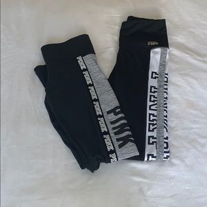 two pairs of PINK Victoria Secret leggings.